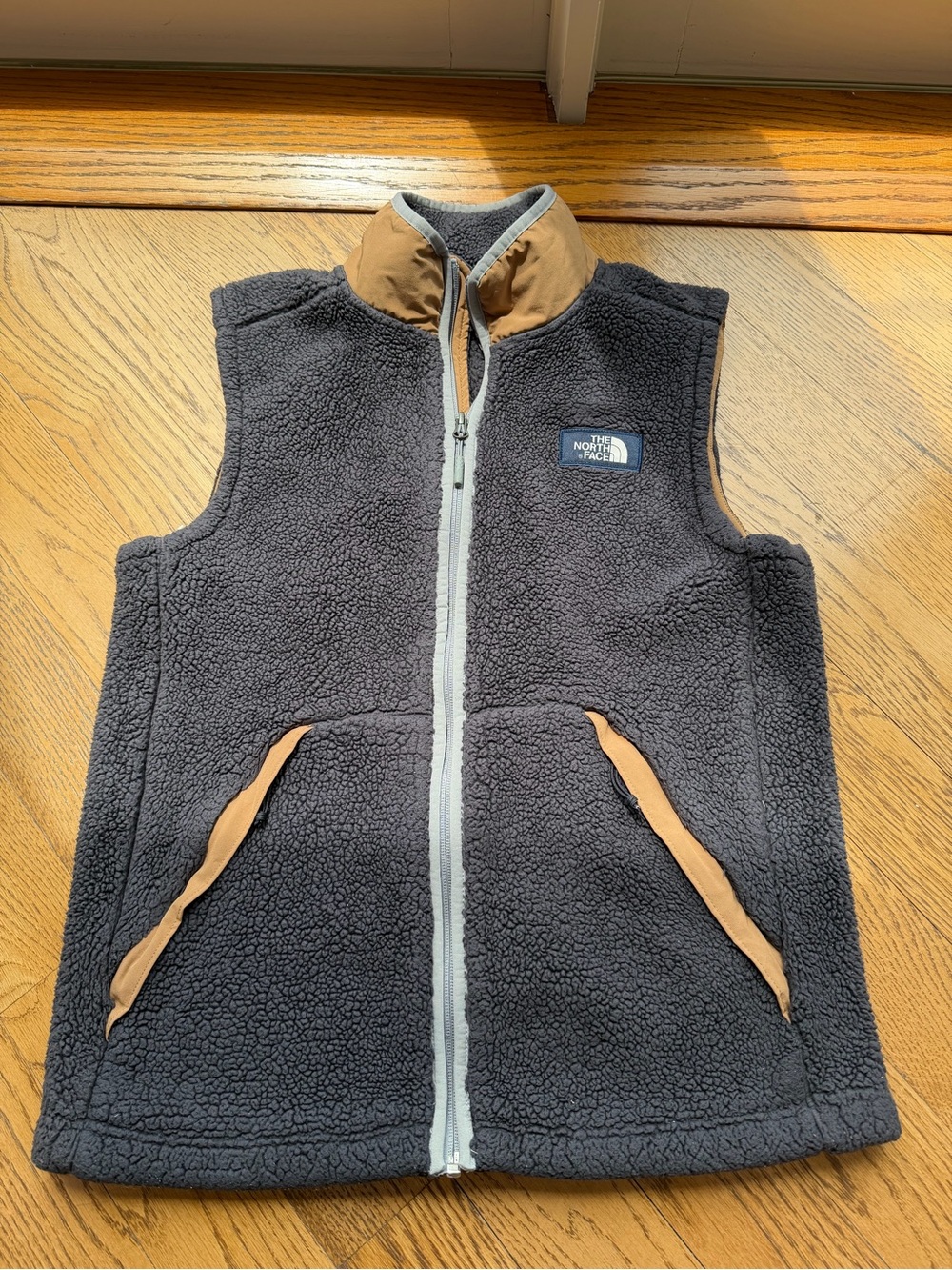 The North Face Dark Blue Sherpa Fleece Vest with Tan Accents